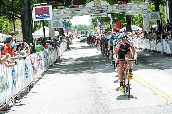 Tom Zirbel (Optum) pulls the group through downtown.