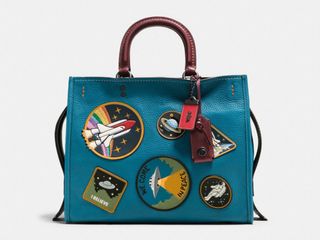 Part of the new "Coach Space" collection, The Rogue is a pebble-leather bag decked out in retro NASA patches. ($895 at Coach.com)