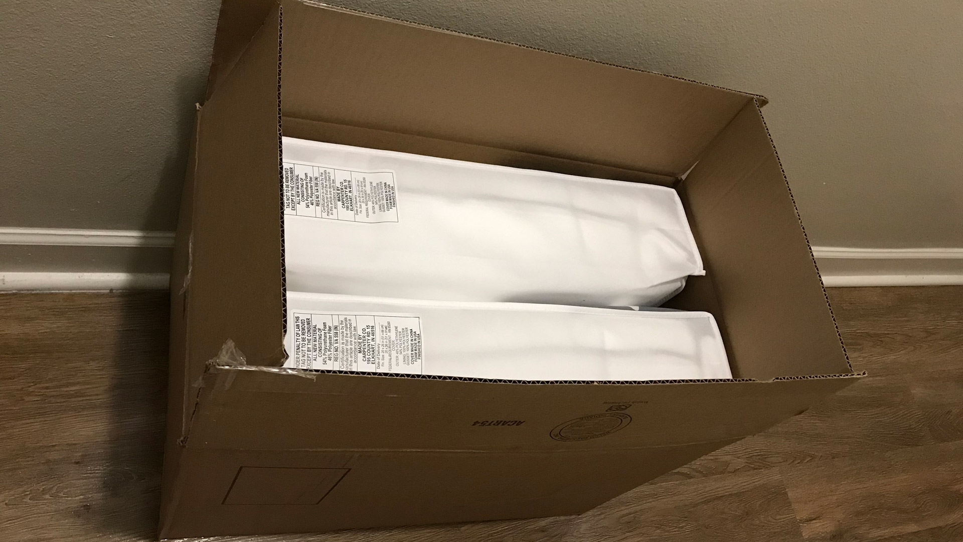Two Sleep Number ComfortFit Pillows in their delivery box