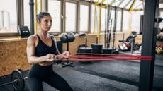 Woman doing resistance band workout