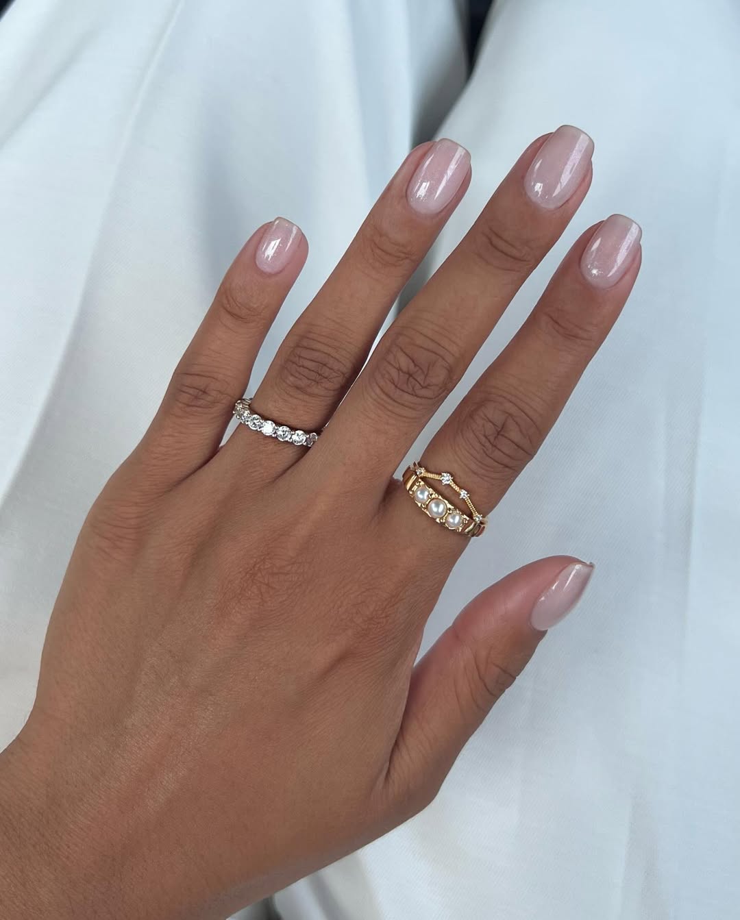 A pink pearlescent manicure