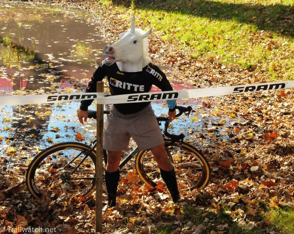 Half man-half unicorn cheers for his favorite racers