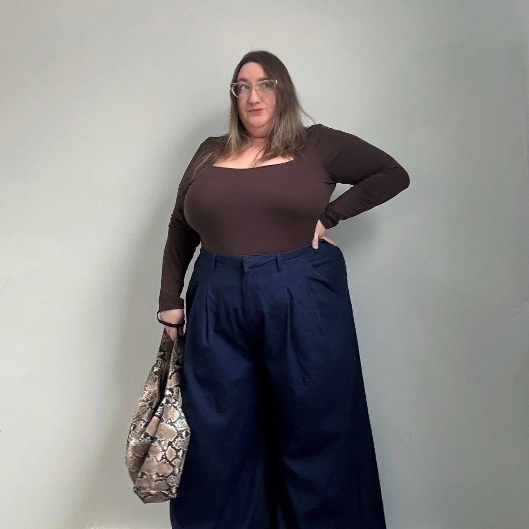 Sarah Chiwaya wearing dark wash denim