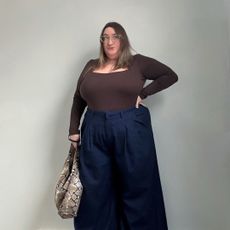 Sarah Chiwaya wearing dark wash denim