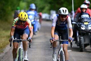 BARSURAUBE FRANCE JULY 27 LR Alena Amialiusik of Belarus and Team CanyonSRAM Racing and Evita Muzic of France and Team Fdj Nouvelle Aquitaine Futuroscope compete in the chase group during the 1st Tour de France Femmes 2022 Stage 4 a 1268km stage from Troyes to BarSurAube TDFF UCIWWT on July 27 2022 in BarsurAube France Photo by Tim de WaeleGetty Images