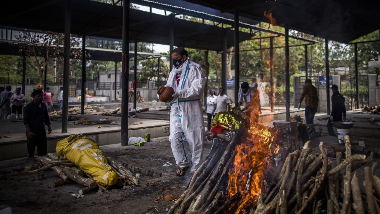 Funeral pyres burning in New Delhi, India 