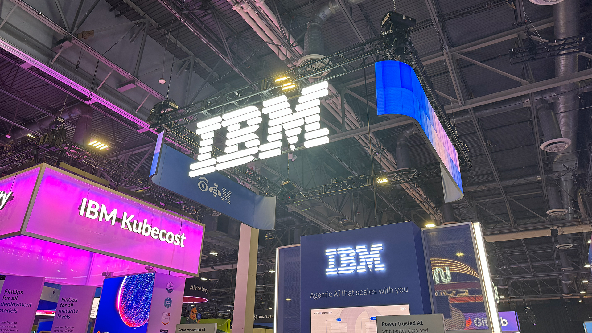 IBM logo and branding pictured at the company's exhibitor stall in the vendor expo hall at AWS re:Invent 2025, hosted at the Venetian Hotel and Casino in Las Vegas, Nevada.