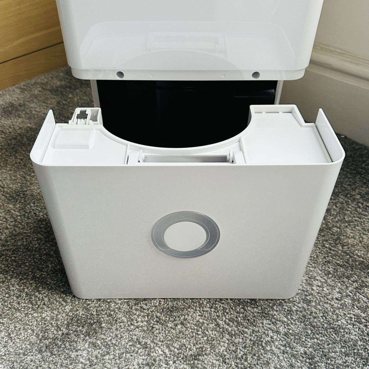 The Pro Breeze 30L High Capacity Smart Dehumidifier review being tested in a room with grey carpet