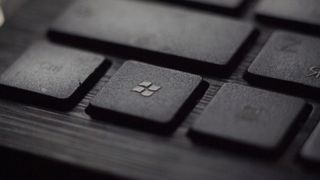 close up on a laptop keyboard and its windows key