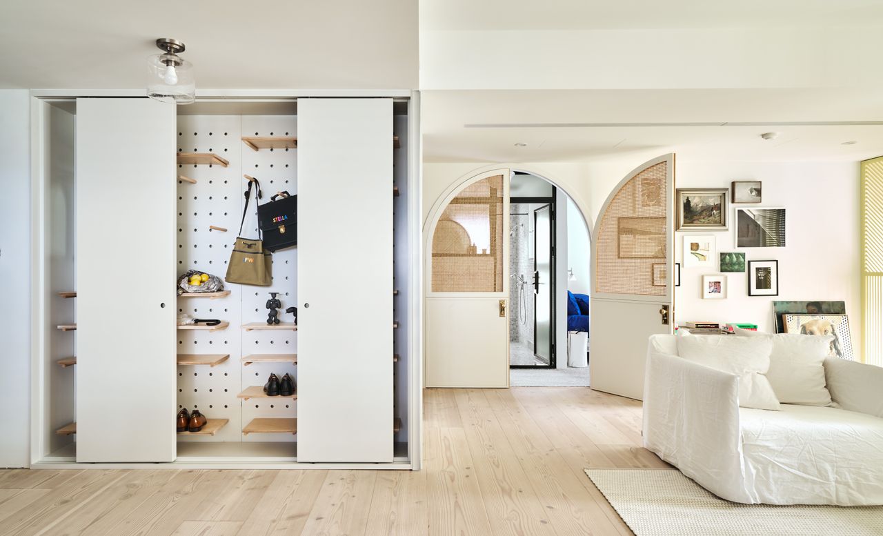 an apartment with an organized hallway