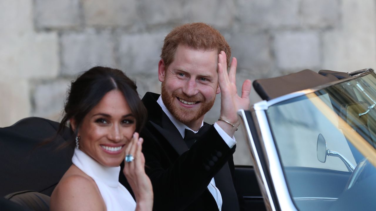 Meghan Markle and Prince Harry in a Jaguar