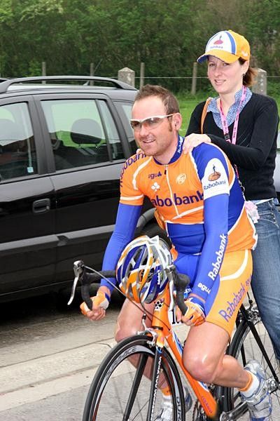 Graeme Brown (Rabobank) escorting his wife Hayley to the start in Wanze. Can't you afford a car, Brownie?