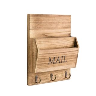 A wooden mail holder with hooks