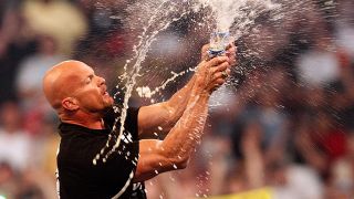 Stone Cold Steve Austin salutes the crowd at Wrestlemania 25