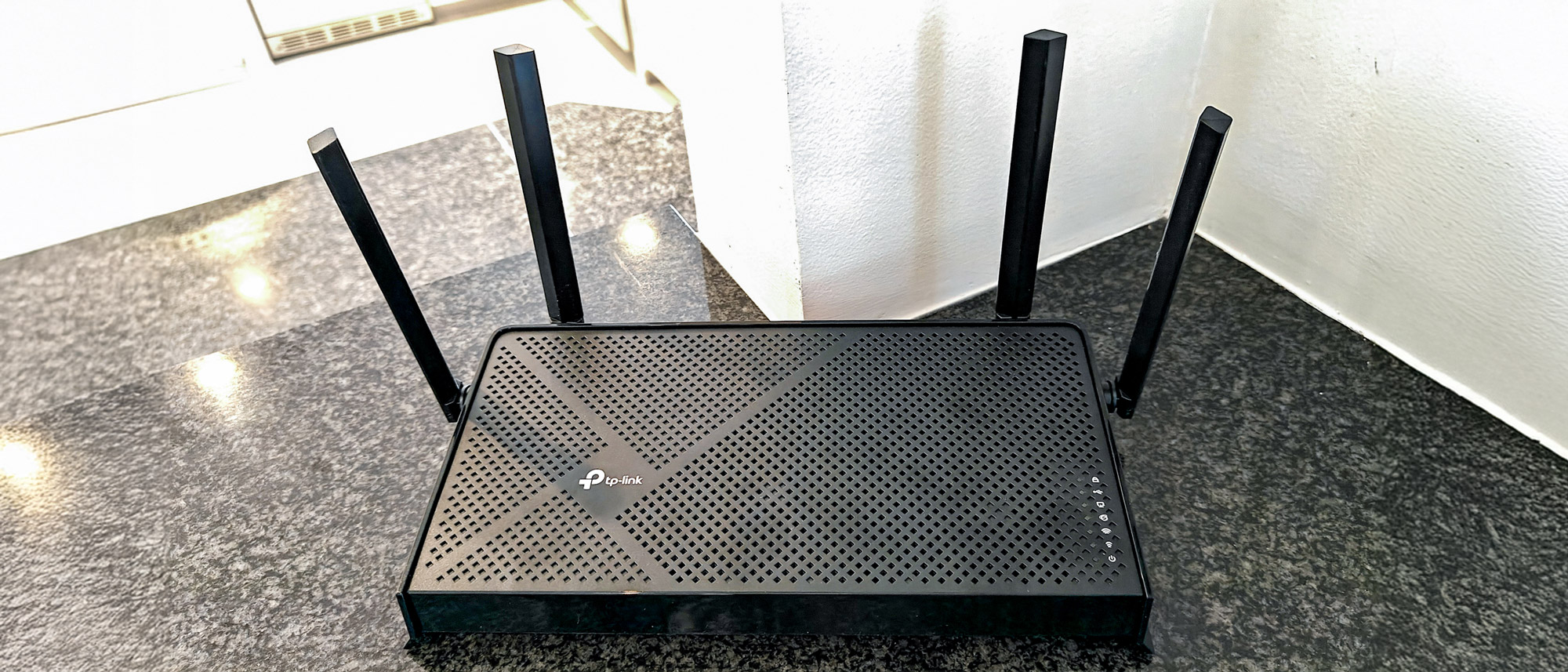 TP-Link Archer BE3600 on a kitchen counter
