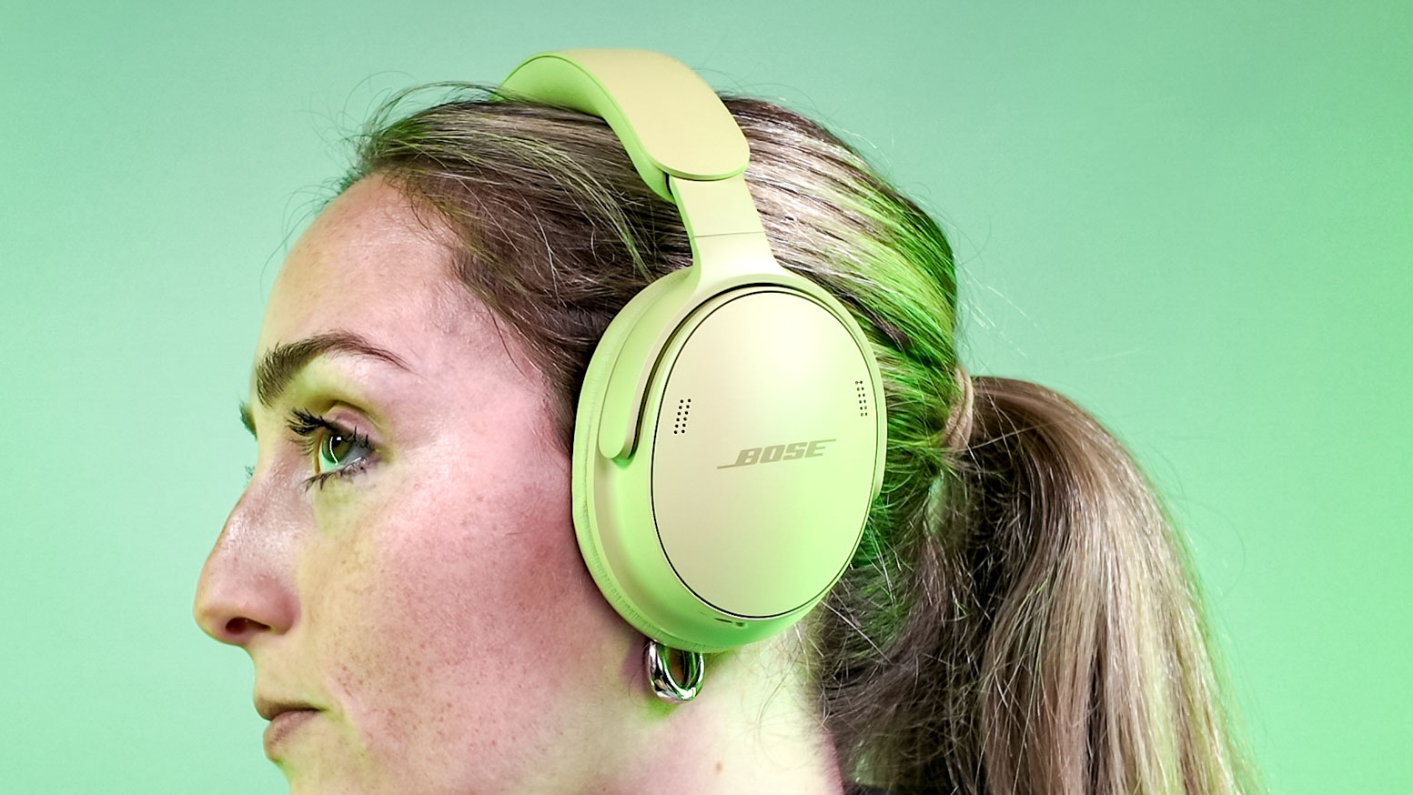 Tom's Guide editor Kate Kozuch wearing the Bose QuietComfort Headphones (2nd Gen)