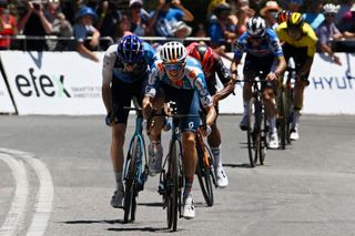 Battling to the line on the top of Willuanga Hill at the 2024 Tour Down Under