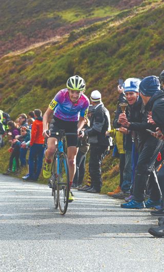 Illi Gardner cycling up a hill