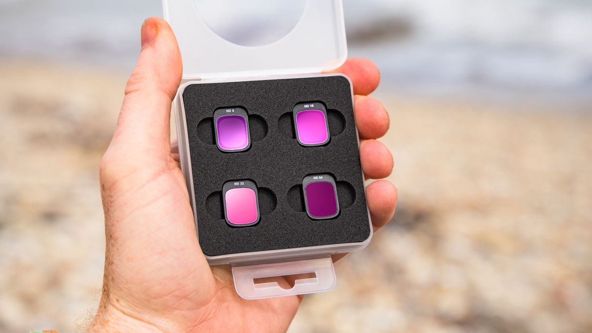 Potensic Atom 3 beginner drone's ND filter pack in user's hand