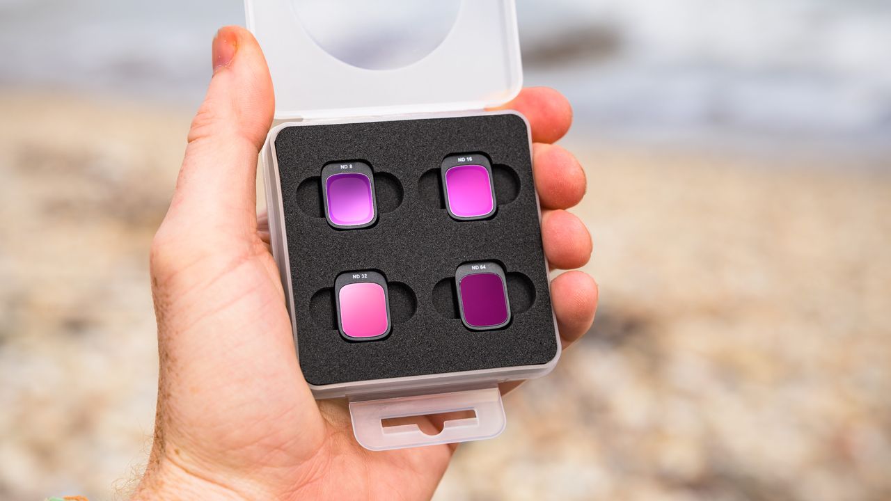 Potensic Atom 3 beginner drone's ND filter pack in user's hand