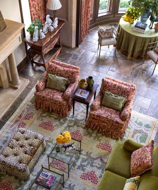 Living room from above with layered patterned carpet