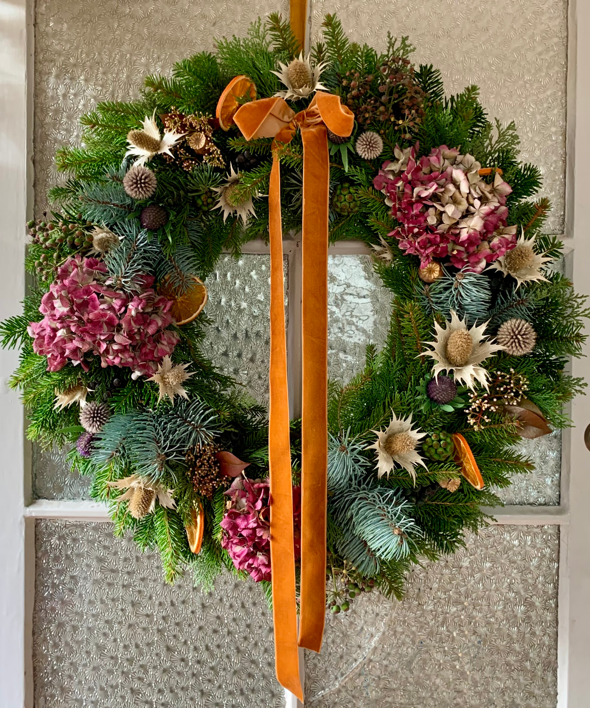 christmas wreath made with dried sea holly flowers