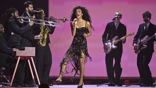 MANCHESTER, ENGLAND - FEBRUARY 28: (EDITORIAL USE ONLY) Olivia Dean performs 'Man I Need' on stage during The BRIT Awards 2026 at Co-op Live on February 28, 2026 in Manchester, England. (Photo by Gareth Cattermole/Getty Images)