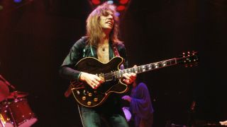 Steve Howe and Yes perform live on stage at Madison Square Garden in New York in June 1979