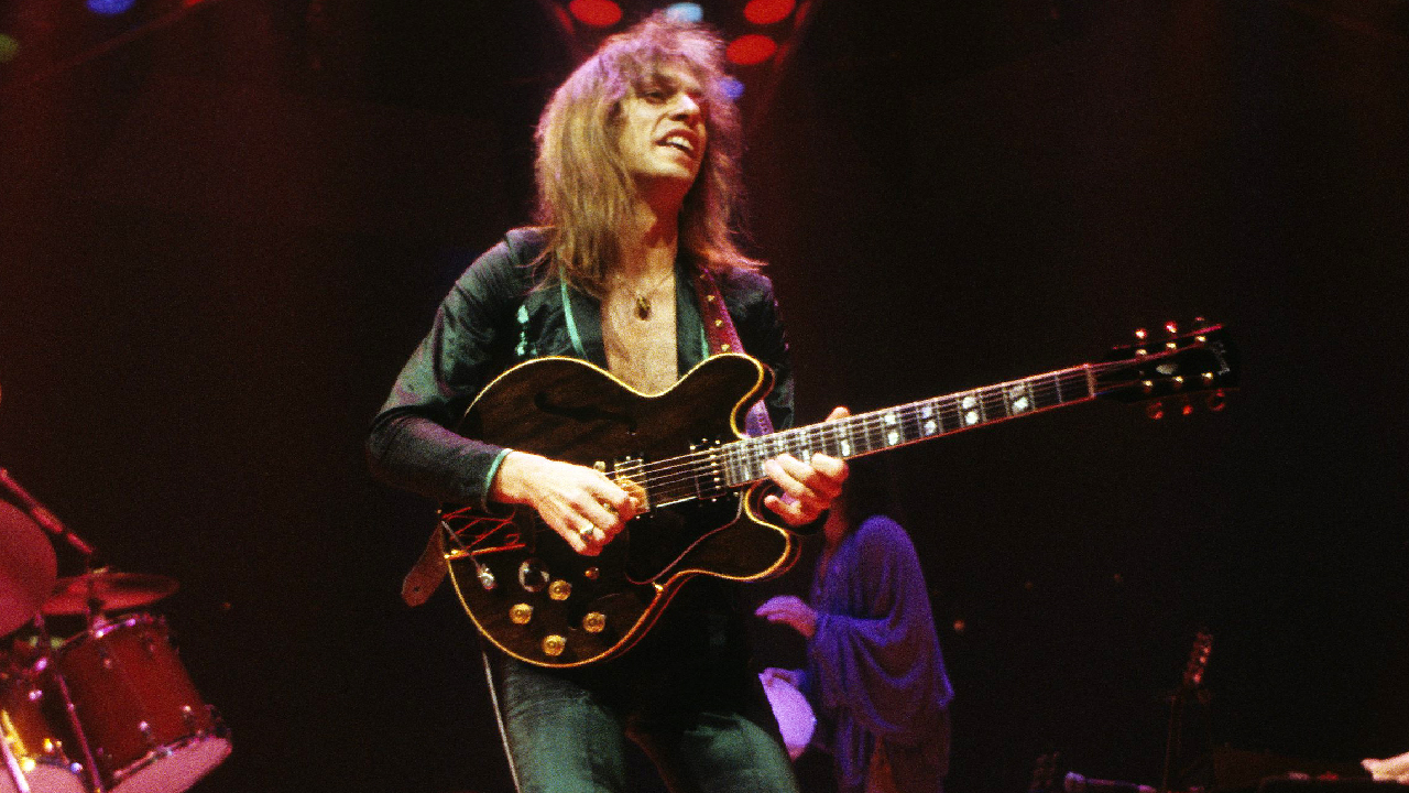 Steve Howe and Yes perform live on stage at Madison Square Garden in New York in June 1979