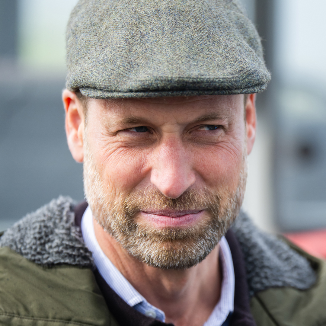 Prince William wears a flat cap with a green hooded coat to visit the Scottish island of Bute with Princess Kate