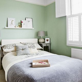 bedroom with green wall