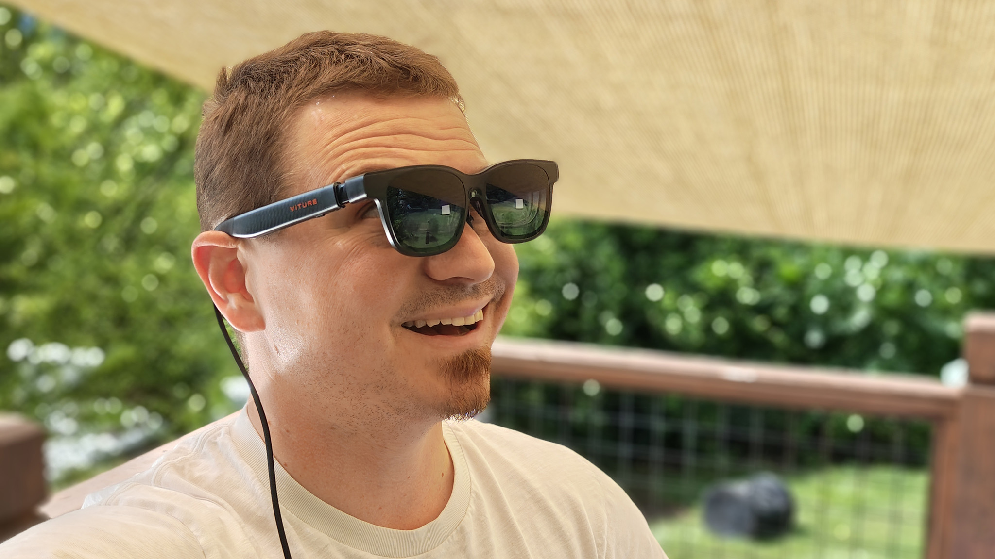 Wearing a pair of Viture Luma Pro glasses while using Spacewalker's Immersive 3D feature