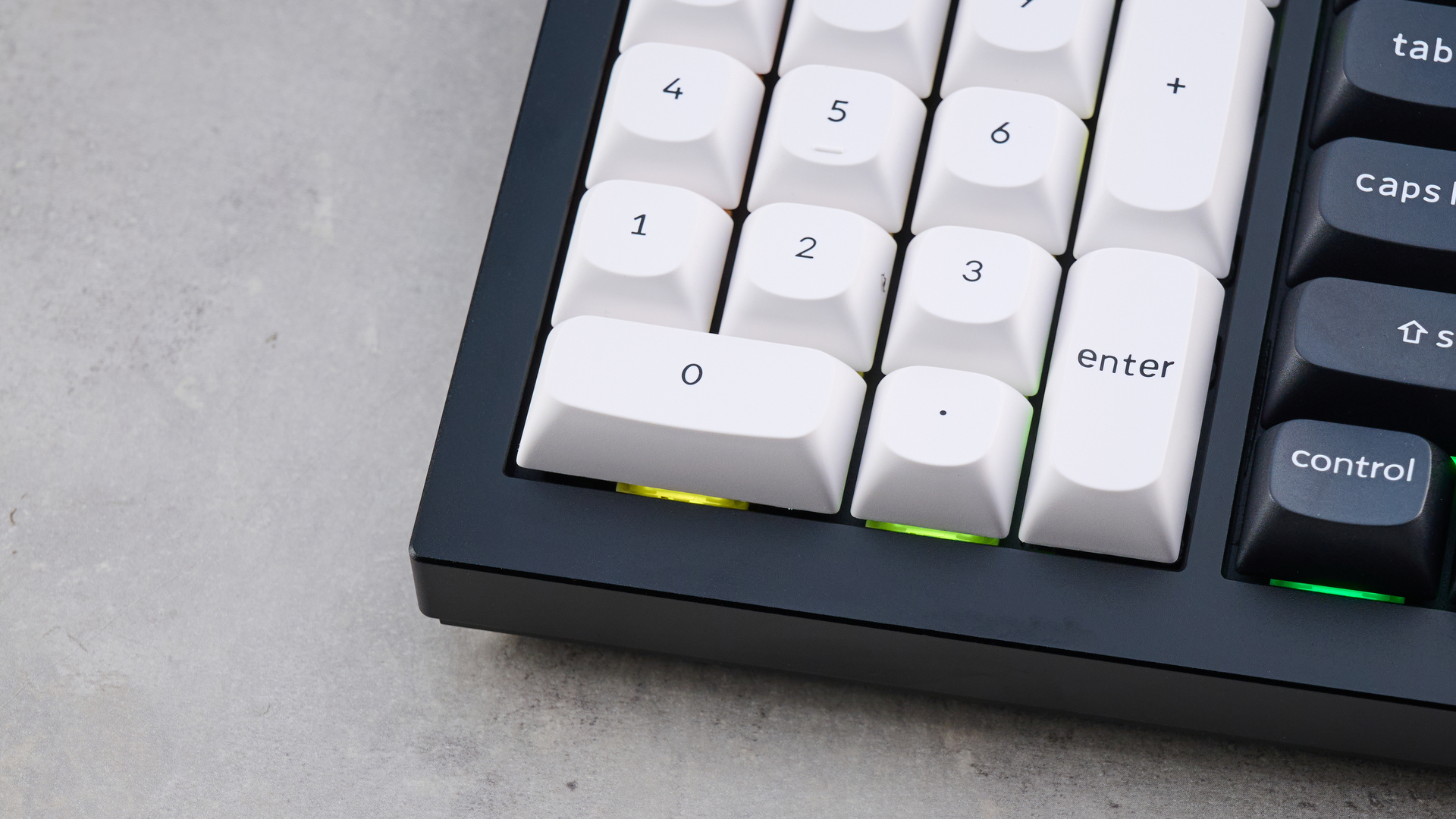 A black, white and red Keychron Q12 HE gaming keyboard with Hall Effect switches