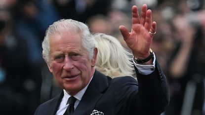 Britain's King Charles III and Britain's Camilla, Queen Consort greet the crowd upon their arrival Buckingham Palace in London, on September 9, 2022, a day after Queen Elizabeth II died at the age of 96. - Queen Elizabeth II, the longest-serving monarch in British history and an icon instantly recognisable to billions of people around the world, died at her Scottish Highland retreat on September 8.