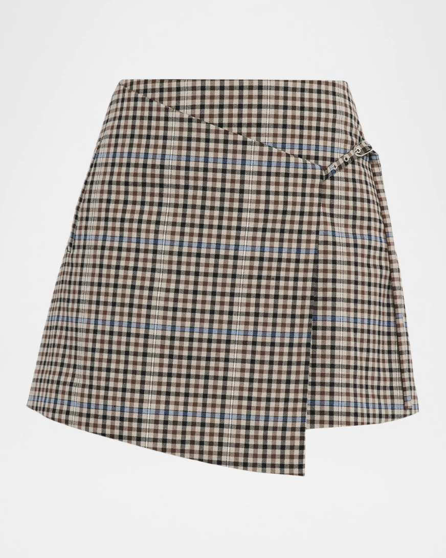 a plaid mini skirt on a plain backdrop