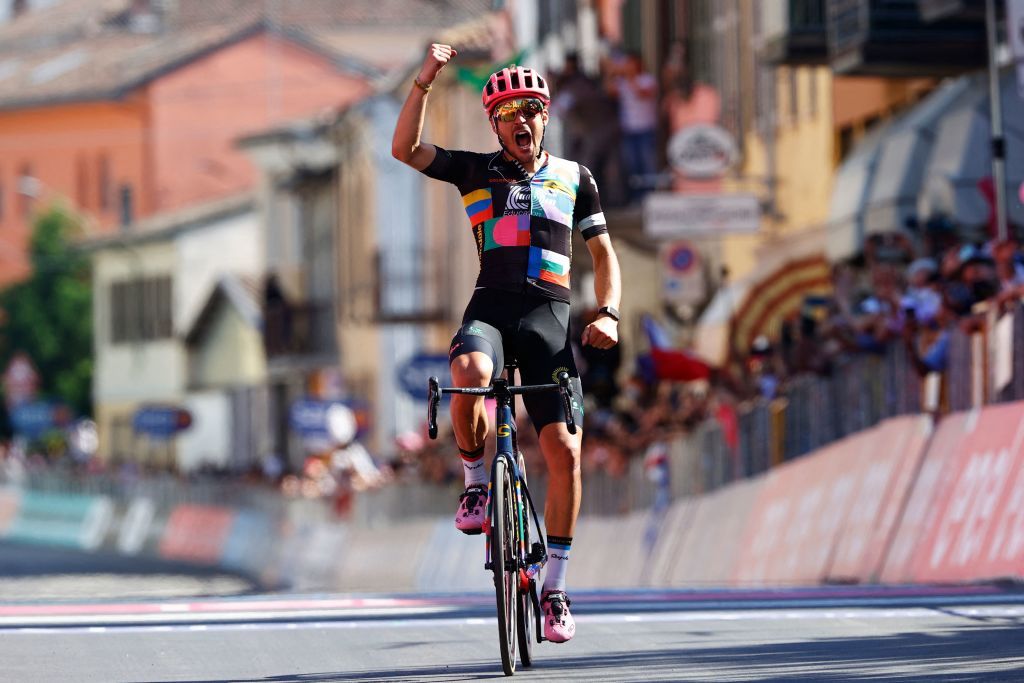Team EF Education rider Italys Alberto Bettiol celebrates as he crosses the finish line to win the 18th stage of the Giro dItalia 2021 cycling race 231km between Rovereto and Stradella on May 27 2021 Photo by Luca Bettini AFP Photo by LUCA BETTINIAFP via Getty Images