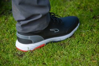 The back of the Puma Alphacat Nitro Golf Shoes
