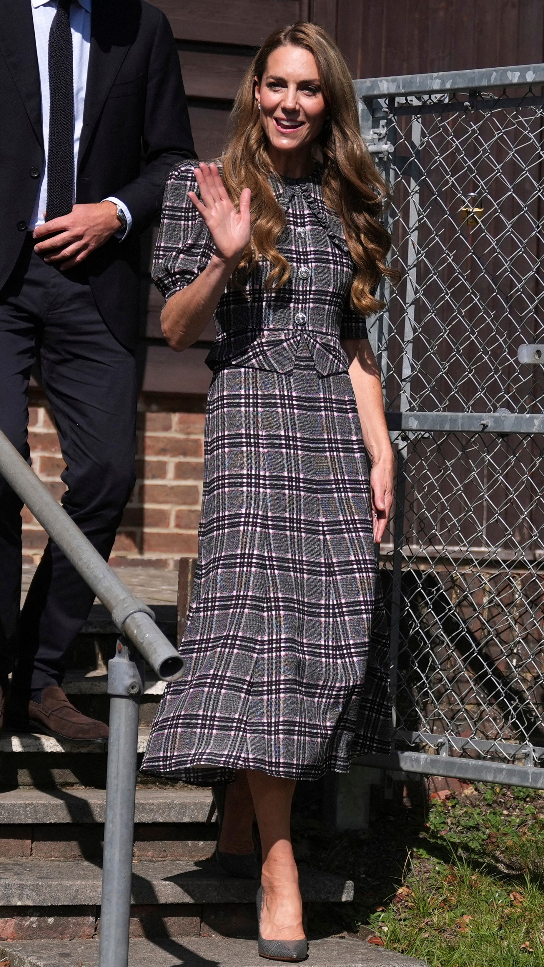 Catherine, Princess of Wales waves as she leaves after a visit to the National Federation of Women's Institute (WI) in Sunningdale, west of London on September 8, 2025