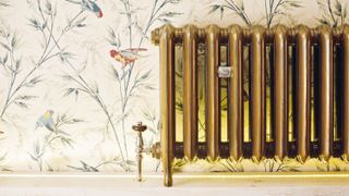 How to make an old home more energy efficient: Princess aged gold vintage radiator