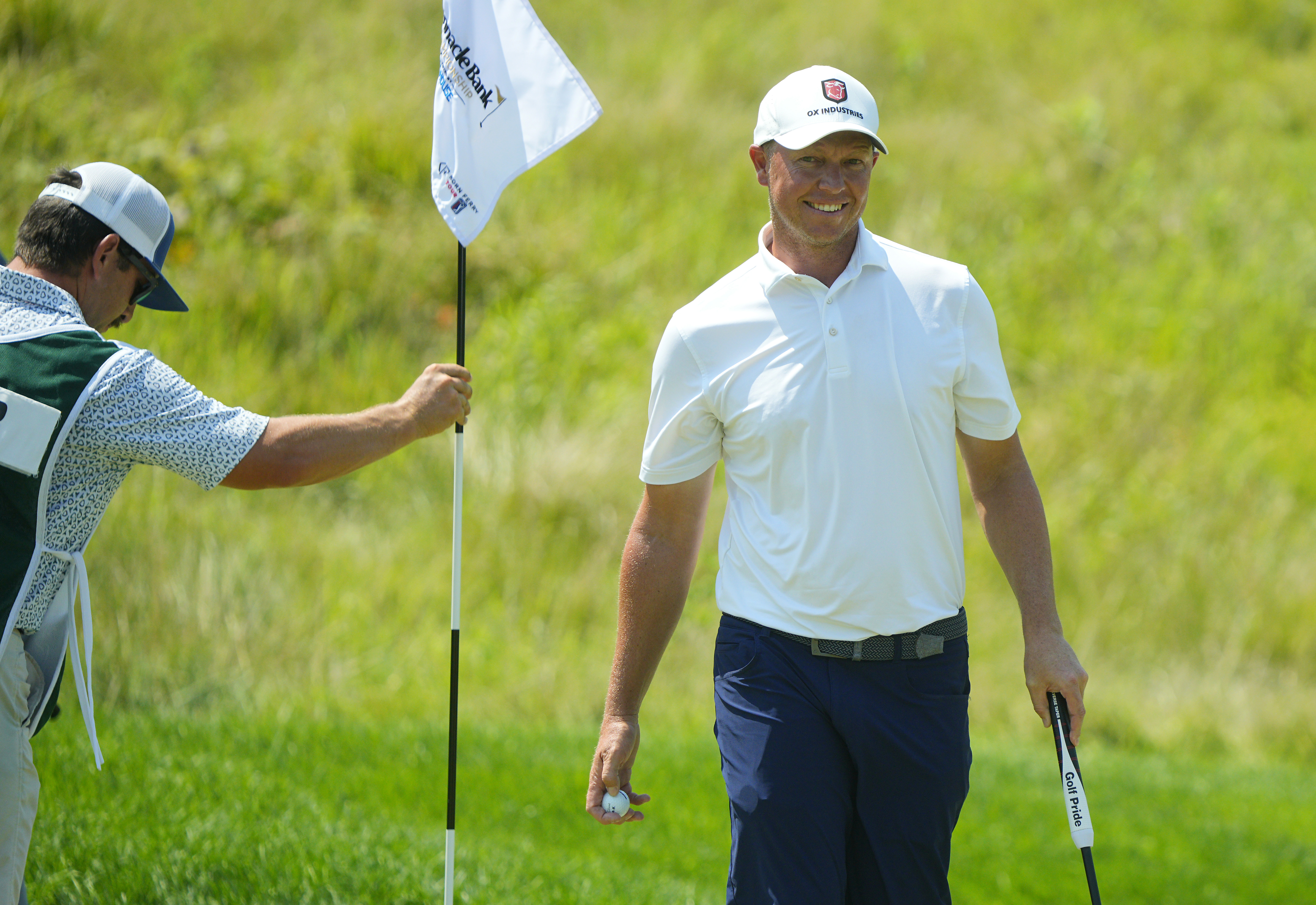 MJ Daffue walks off the green