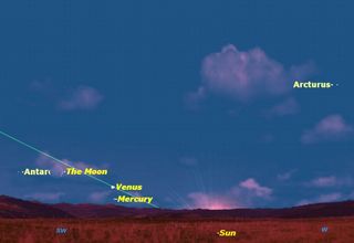 A triple treat in the western sky just after sunset on Friday, October 28: a close grouping of Venus, Mercury, and the slender crescent moon. 
