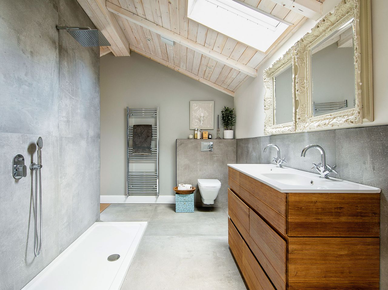 bathroom in neutral colors with concrete tiles and shower backsplash