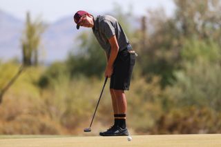 David Puig putts during the 2022 NCAA Division One Men's Golf Championship