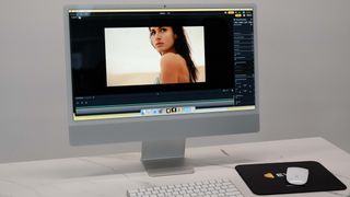 Evoto Video running on a Mac computer, with the screen showing a video frame of a woman staring off-camera 