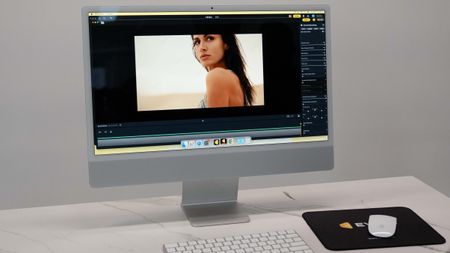 Evoto Video running on a Mac computer, with the screen showing a video frame of a woman staring off-camera 