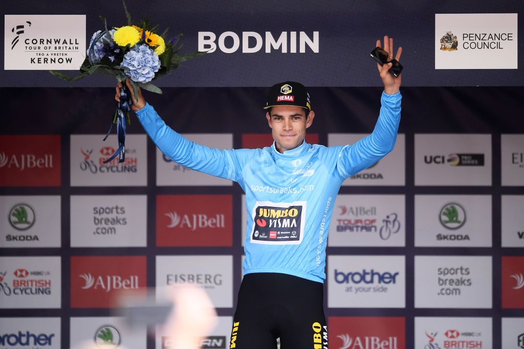 BODMIN ENGLAND SEPTEMBER 05 Wout Van Aert of Belgium and Team Jumbo Visma celebrates winning the turquoise points jersey on the podium ceremony after the 17th Tour of Britain 2021 Stage 1 a 1808km stage from Penzance to Bodmin TourofBritain TourofBritain on September 05 2021 in Bodmin England Photo by Harry TrumpGetty Images