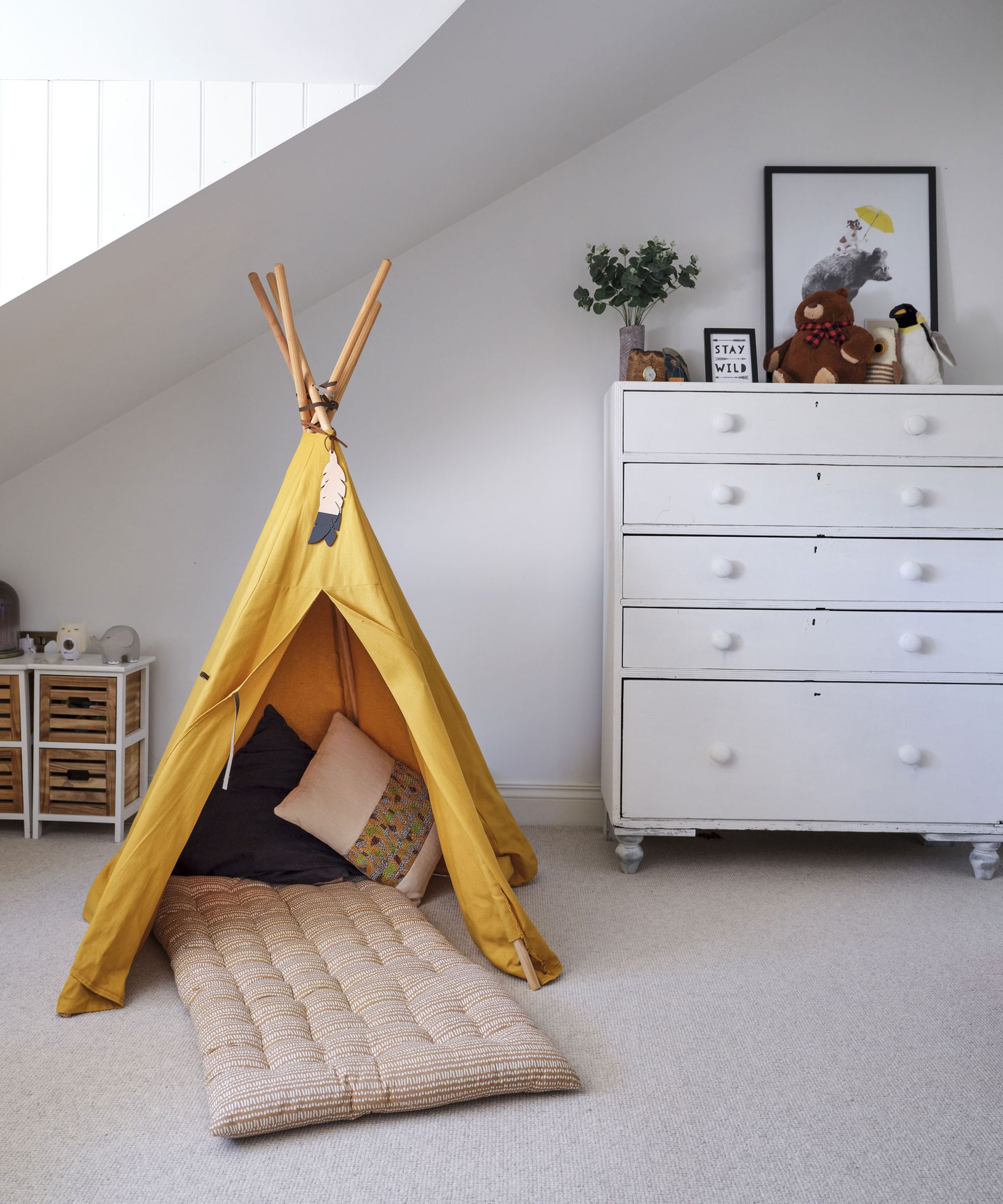 Boys bedroom with yellow teepee in Cornish coastal newbuild