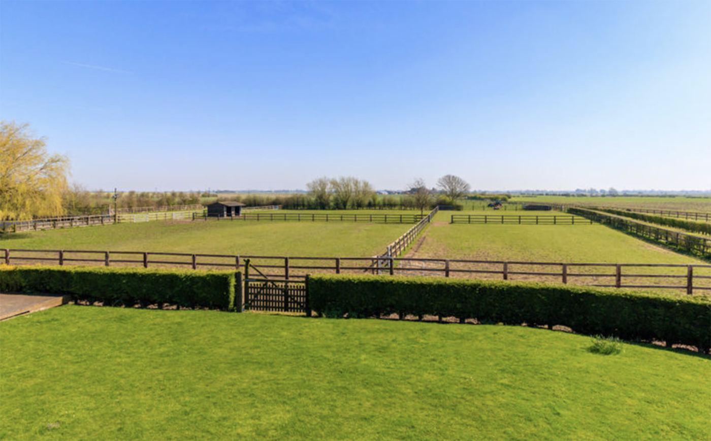 Fenced and flat grass paddocks in Lincolnshire