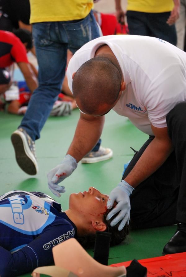 Dolores Rodriguez (Argentina) is attended to after a crash in the women's omnium qualifier