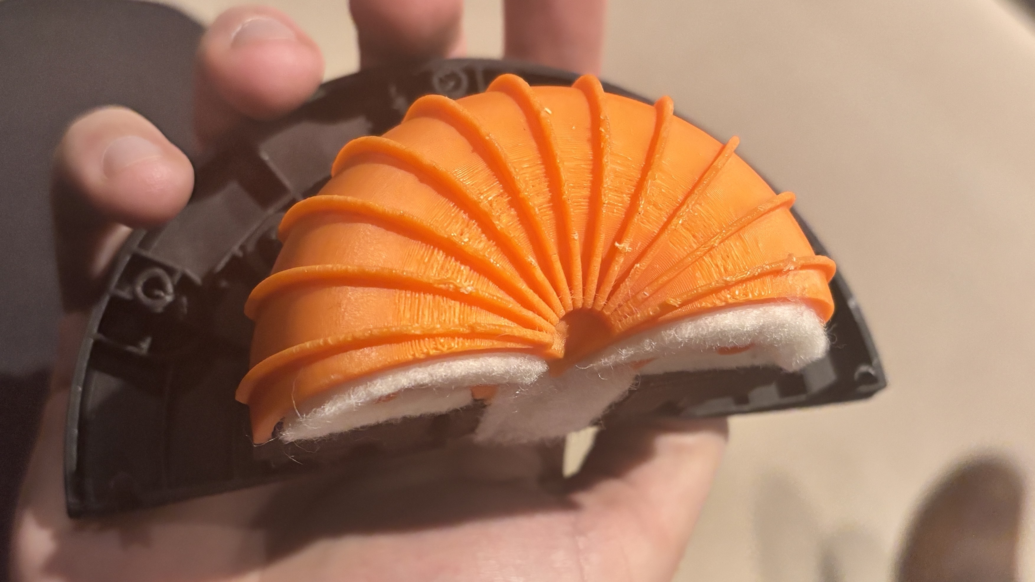 Close-up of Cambridge Audio's 'Torus' tweeter design being held in the hand